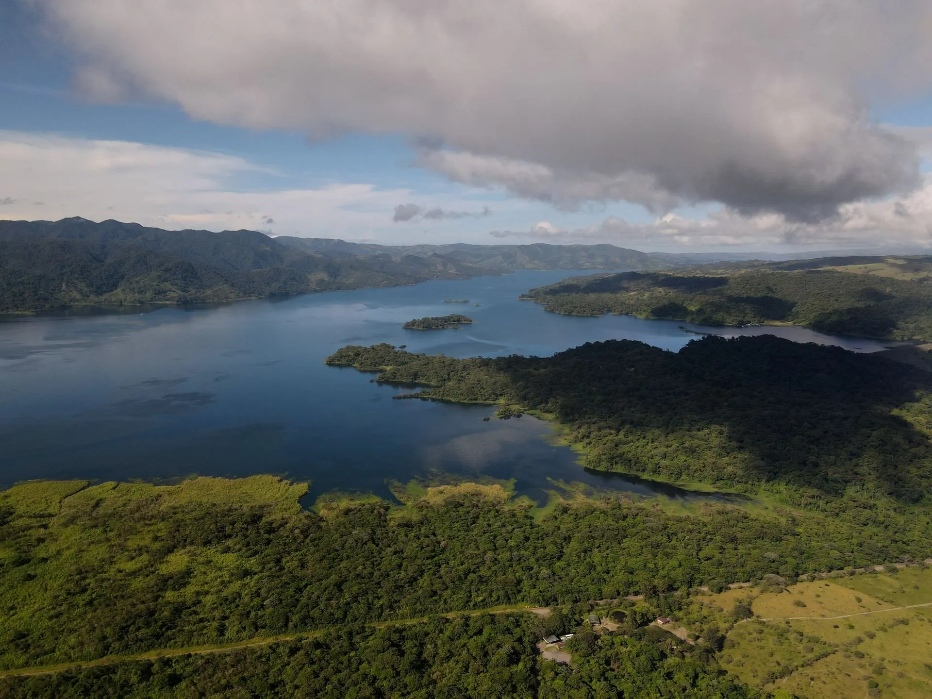 Lake Arenal from above, with forested shores and islands